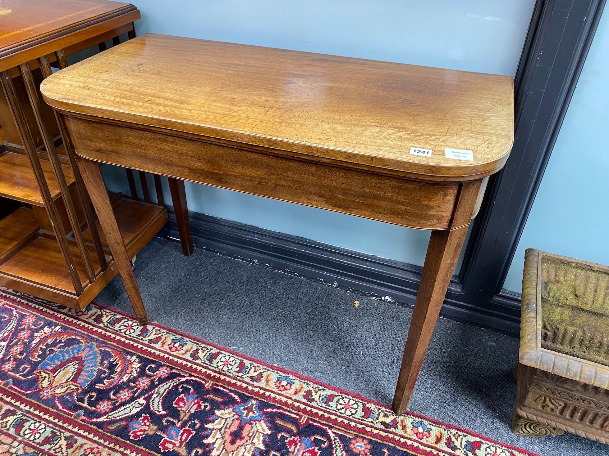 A George III mahogany card table, width 91cm, depth 45cm, height 73cm *Please note the sale commences at 9am.
